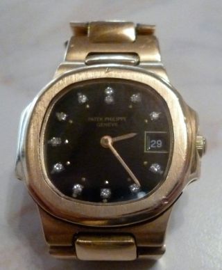Patek Philippe Damen Uhr Gelbgold Schwarzes Zifferblt Mit Diamanten Bild