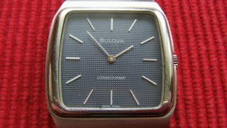 Elegante Armbanduhr Bulova Longchamp Handaufzug Bild