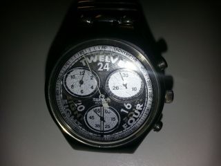 Swatch Uhr,  Silbernes Stretcharmband Bild