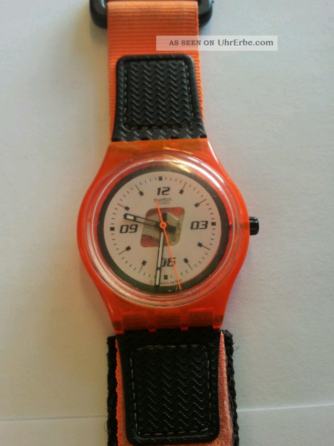 Swatch Uhr Orange Snow Pass Armbanduhren Bild