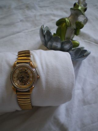 Interesante Fossil Uhr In Gold Bild