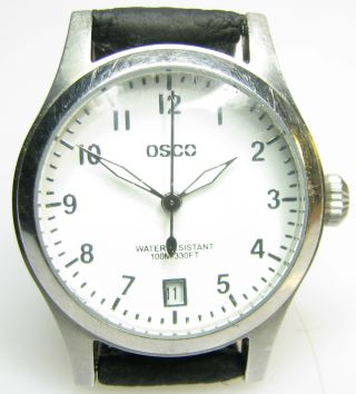 Osco Edelstahl Quartz Armbanduhr Mit Weißem Zifferblatt Und Arabischen Zahlen Bild