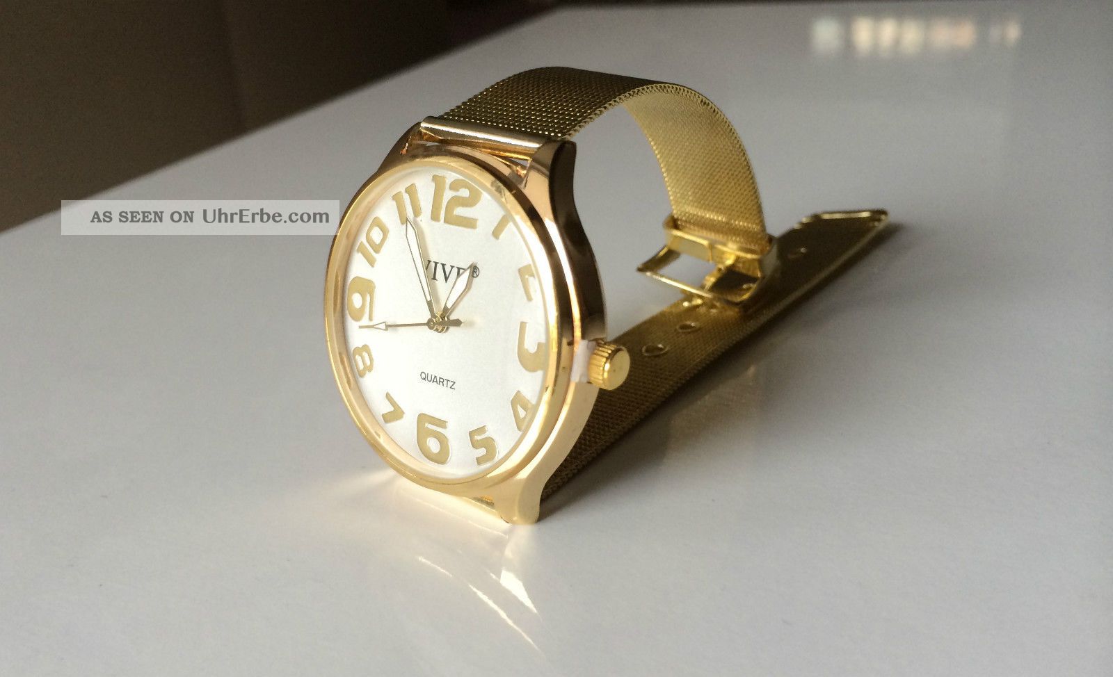 Damenuhr 36 mm in Gold und Grau mit Lederarmband