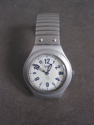 Swatch Irony Armbanduhr Uhr Alluminium Silberfarben Damen Herren Flexarmband Bild