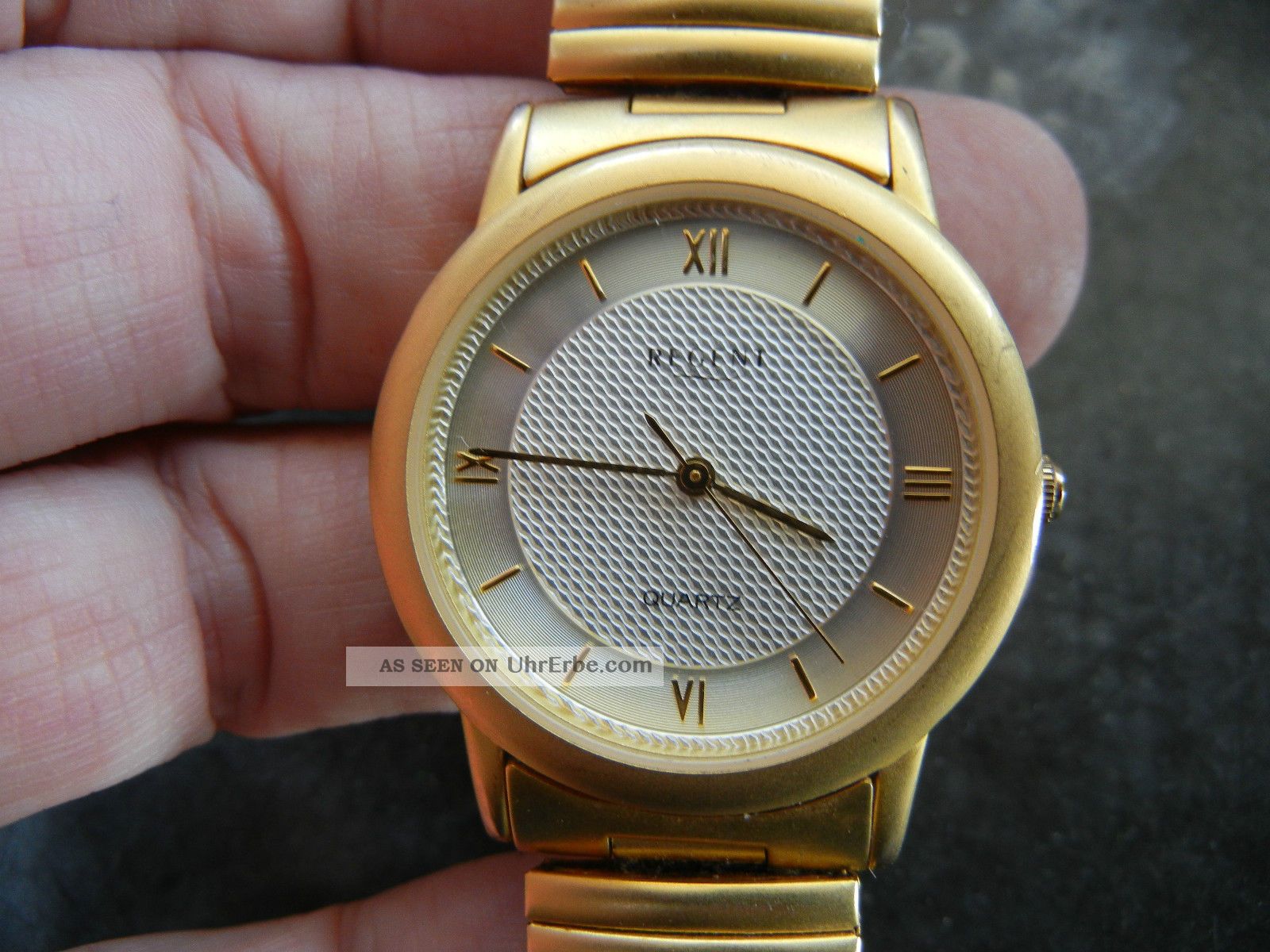 Regent Quartz Uhr Swiss Parts Ronda 1 Jewel Armbanduhren Bild