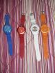 Vier Damen Armband Uhren,  Kunststoff (blau,  Orange,  Weiß U.  Rot) Armbanduhren Bild 1