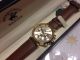 Elegante Herrenuhr / Armband Uhr Edelstahlgehäuse Goldfarbenes Ziffernblatt Armbanduhren Bild 9