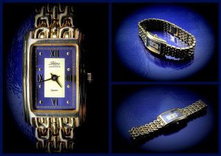 Goldene Junghans Damen Schmuckband Uhr Helena 46/ 5847 E 209 Cal Ronda Swiss Bild
