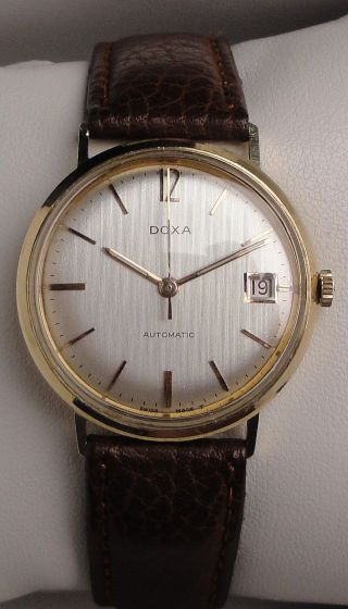 Klassische Armbanduhr Automatic Doxa In 14 K Gold Mit Textilem Zifferblatt Bild