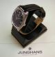 Hau,  Junghans,  Komplett Edelstahl,  70er Jahre,  Handaufzug Schwarzes Zifferblatt Armbanduhren Bild 1