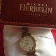 Michel Herbelin Uhr,  Edelstahl/vergoldet,  25mm Durchmesser,  - Schatulle Armbanduhren Bild 2