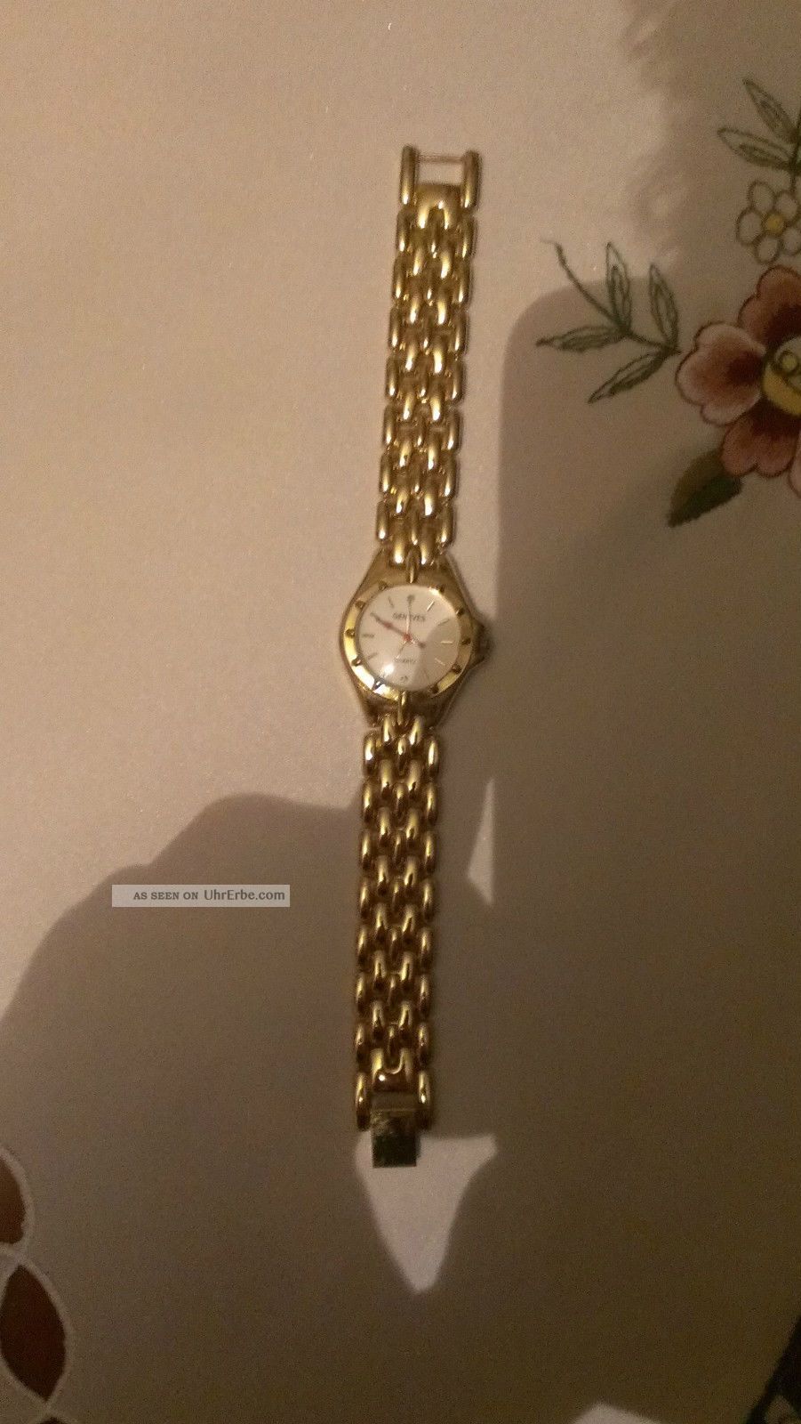 Goldene Damen Uhr Geneves Armbanduhren Bild