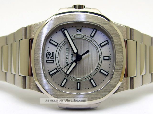 Patek Philippe Nautilus Medium - Ref: 7011/1 - In 18k Wg,  Inkl.  19,  Ungetragen Armbanduhren Bild
