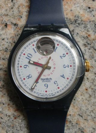 Swatch Sam103 C Automatik Classic Cheddar - In Verpackung - Bild