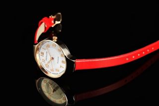 Excellanc Damenuhr Rose Gold,  Rotes Armband Bild
