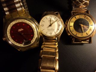 Drei Armbanduhren Swatch (automatic),  Bergisch (mechanisch) Funktioniren,  Anker Bild