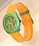 Benetton Armbanduhr - Unisex / Grün & Gelb / Quarz Armbanduhren Bild 4