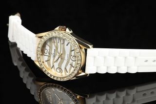 Adrina Damen Uhr Silikon Armbanduhr Strass Weiß Gold Zebra Bild