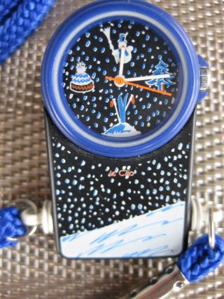 Le Clip Uhr - Schweiz - Kultuhr 80er Jahre - Winter Design - Umhänguhr,  Clipuhr Bild