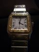 Cartier,  Santos De Cartier,  Edelstahl,  18k,  750 Gelbgold,  Diamanten - Lunette. Armbanduhren Bild 1