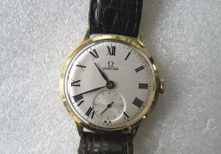Ω Armbanduhr Omega,  ➔ 18 K Gelbgold ➔ Kaliber 30 T2 ,  ➡ Ca.  1939/40 ➡ Top. Bild