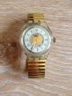 Swatch Automatic Damenuhr Stretcharmband Gold Armbanduhren Bild 1