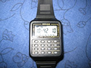 Armbanduhr Mit Taschenrechner - Schöner Gag Für Den Adventskalender Bild
