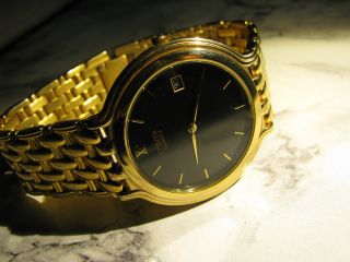 Citizen - Herren Armbanduhr Mit Datumsanzeige Und Quarzwerk Vergoldet Bild
