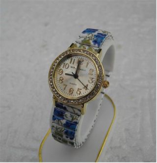 Bezaubernd Damen Uhr - Flexi Uhrband - Blau - Rosen - Mit Steinen Besetzt - Top Bild