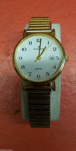 Schöne Goldfarbende Dugena Saphir Damenuhr Uhr Flexarmband Deckel Ist Goldfarben Bild