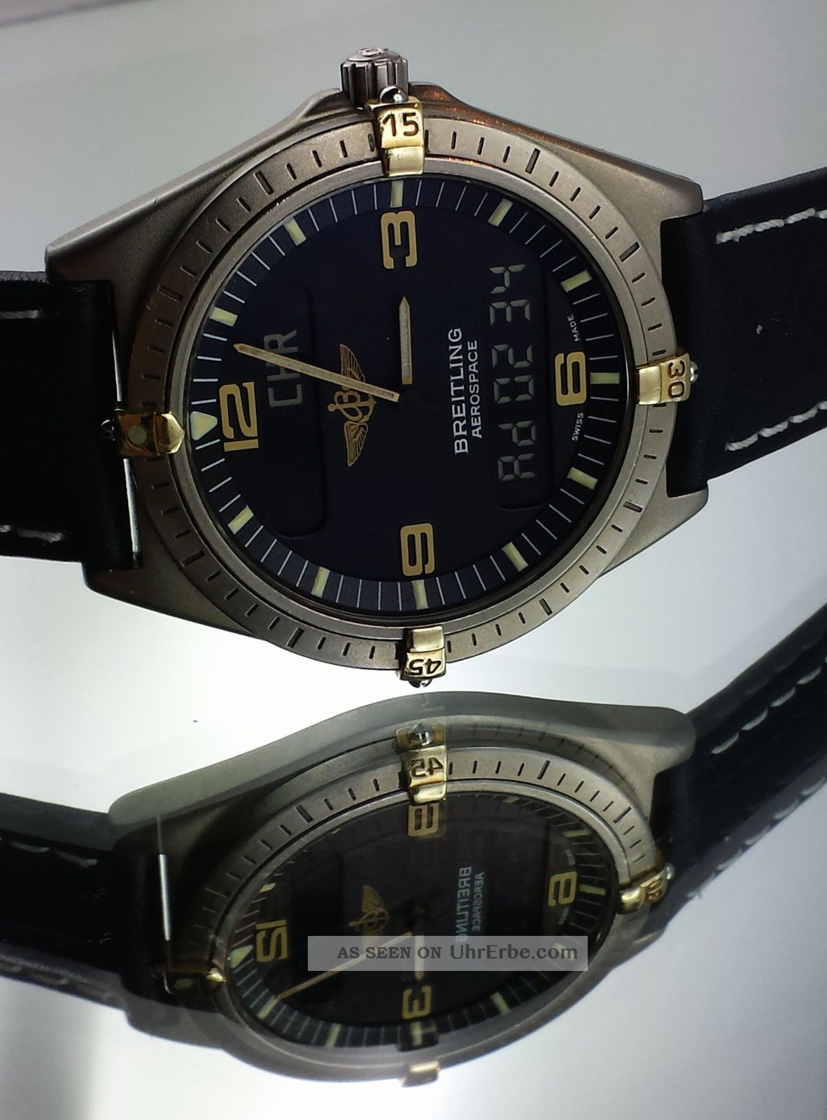 Breitling Aerospace Professional Navitimer F56061 Gold Titan Armbanduhren Bild