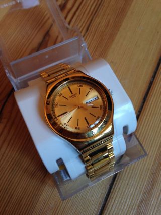 Swatch Uhr Gold Yellow Medal Bild