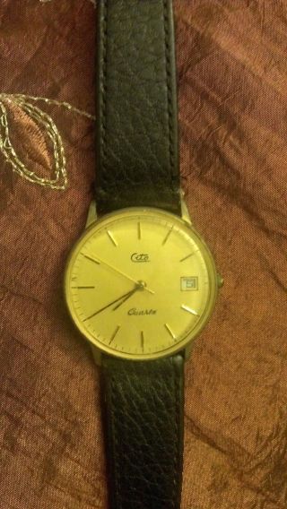 Cito Armbanduhr - Goldenes Zifferblatt - Braunes Armband Mit Datum Bild
