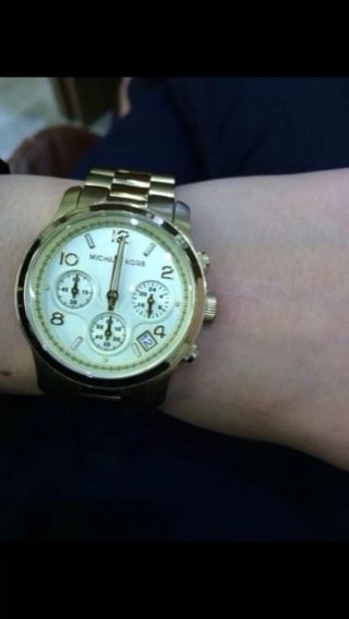 Michael Kors Uhr Gold. Bild
