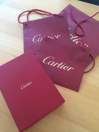 Cartier Schmuckbox Und Tüten Bild