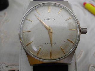 Angelus,  Le Locle,  Swiss,  Herrenarmbanduhr,  Automatic Kal.  Eta 2451.  Sehr Seltene Uhr Bild