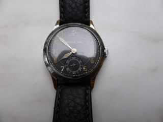 Armbanduhr Jaeger Le Coultre,  Etwa 1940,  Schwarzes Blatt Bild