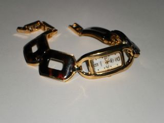 Neuwertige Bt Damen Armbanduhr Mit Braun/schwarzen Inlay`s Bild