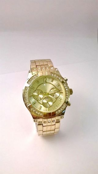 Mode Uhr In Gold Armbanduhr Damenuhr Herrenuhr Mit Strasssteinen Bild