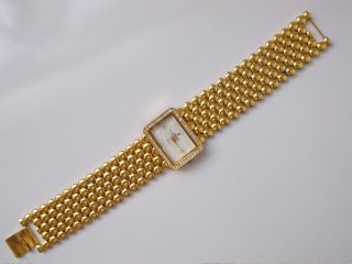 Uhr Damenuhr Armbanduhr Metall Goldfarben Mit Steinchen Modeschmuck Uhr Bild
