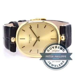 Armbanduhr Patek Philippe Ellipse 18kt Gelbgold Handaufzug Gold Zifferblatt Bild