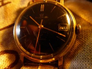 Hau Ducado Uhr Automatik 60er Jahre Schwarzes Zifferblatt Goldfarbenem Armband Bild