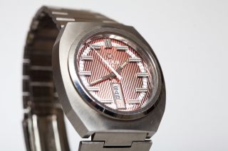 Milus,  70er Jahre Hau,  Armbanduhr,  Herren Bild